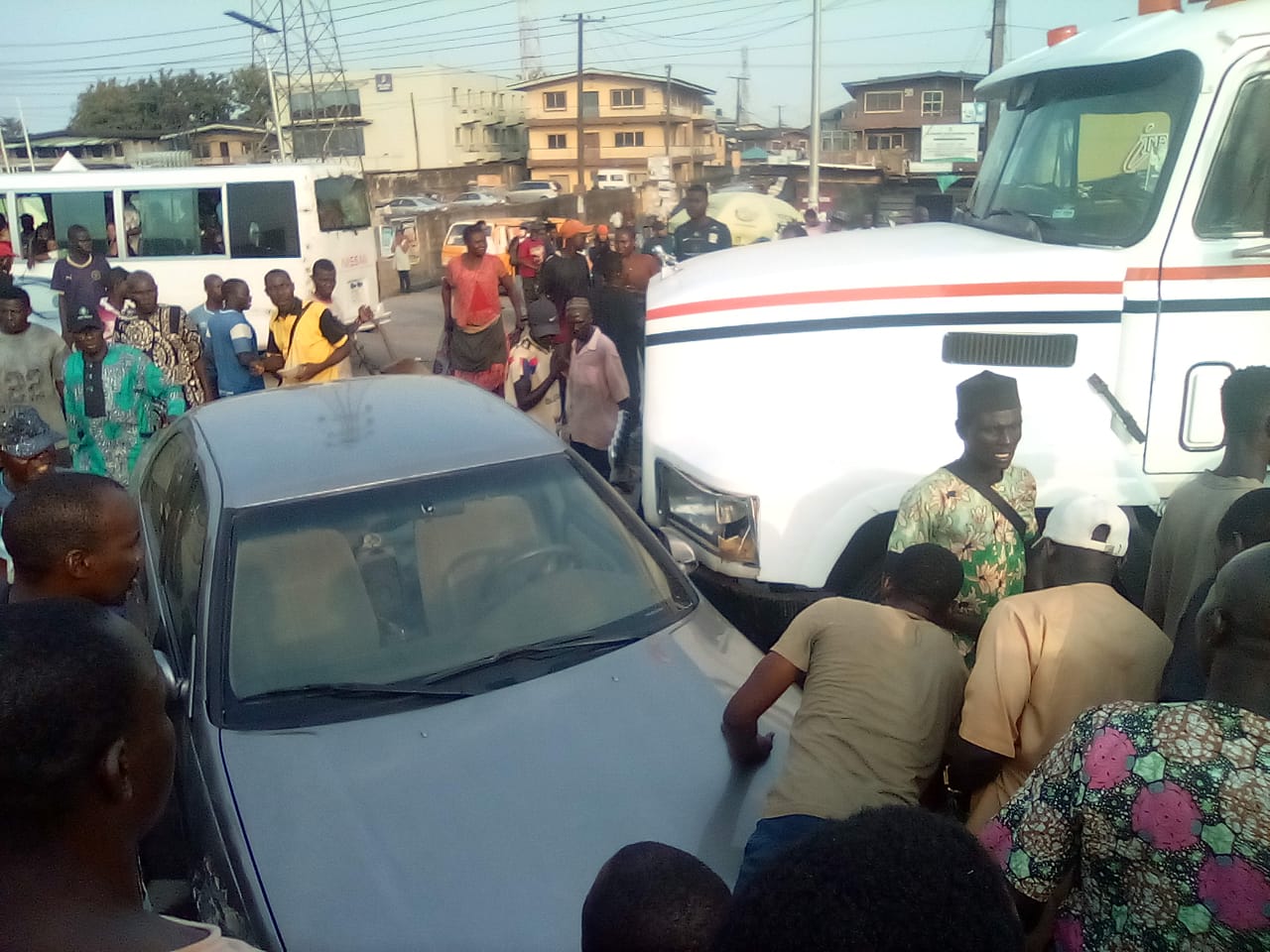 Learner Driver, Container Truck Collide at Ile-Ile Bus Stop, No Serious Injury Reported